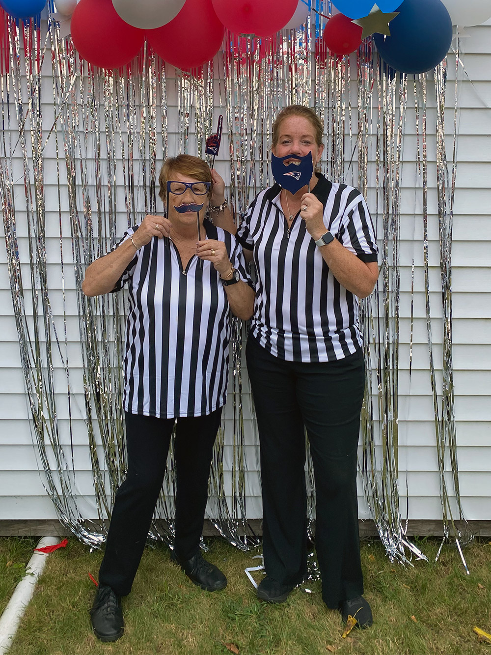 Simply Serving Team Wearing Referee Uniforms for an Event